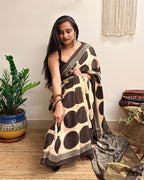 All Eyes: Cream Ajrakh Handblock Printed Modal Saree with Tissue Pallu
