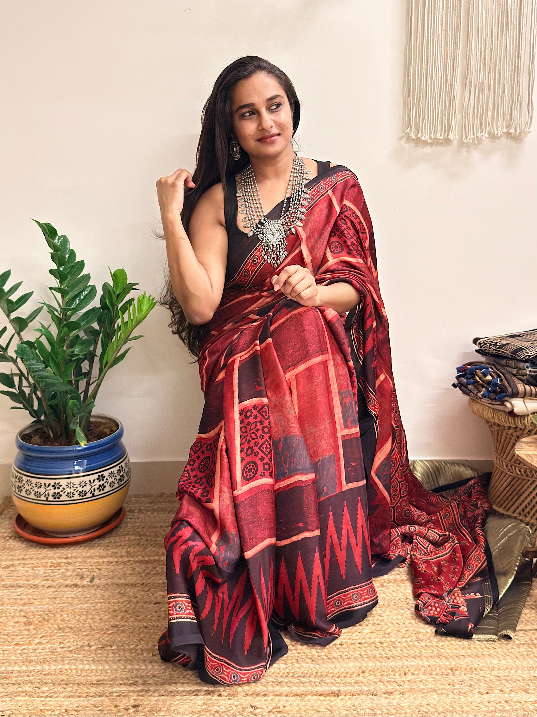 Jugnu: Deep Red and Black Ajrakh Handblock Printed Modal Saree with Tissue Pallu