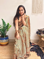 The Eclipse: Beige and Black Striped Ajrakh Handblock Printed Modal Saree