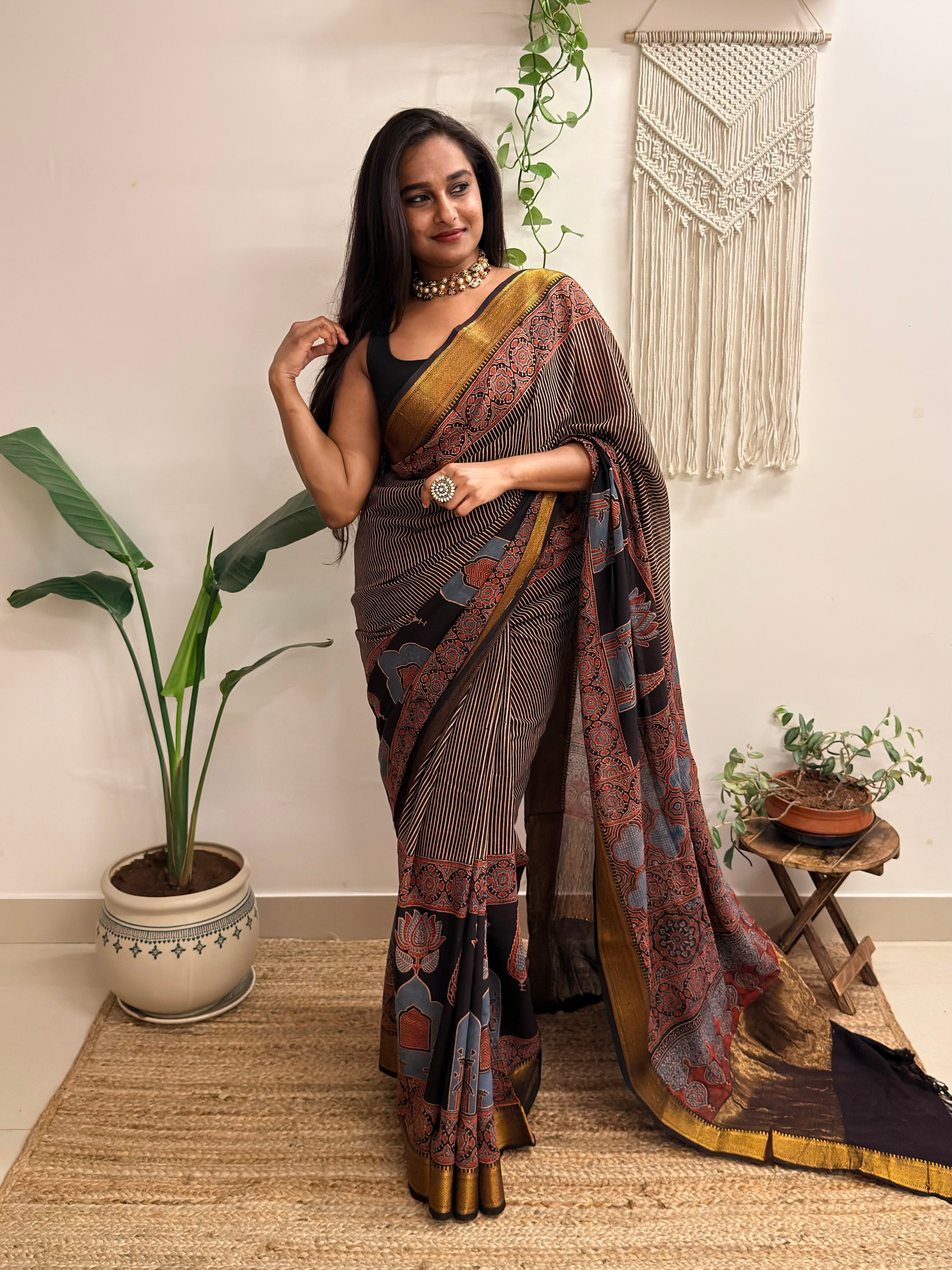 Adaa: Black Ajrakh Handblock Printed Mul Cotton Saree with Zari Border