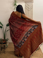 Dilruba: Cream and Red Ajrakh Handblock Printed Dola Silk Saree