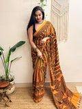 Basant: Turmeric Ajrakh Handblock Printed Mul Cotton Saree
