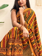 Basant: Turmeric Ajrakh Handblock Printed Mul Cotton Saree