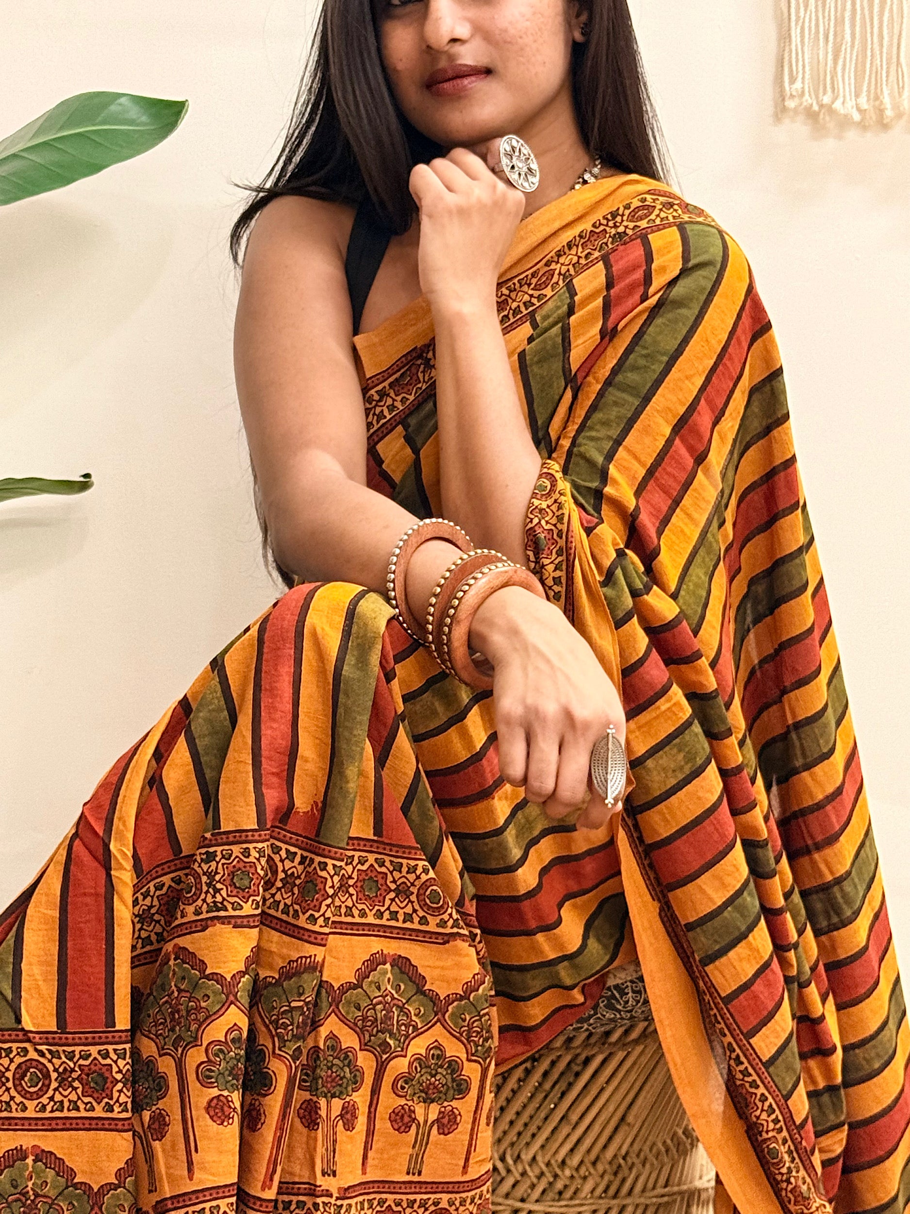 Basant: Turmeric Ajrakh Handblock Printed Mul Cotton Saree