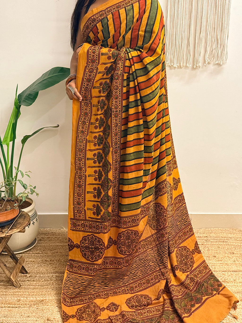 Basant: Turmeric Ajrakh Handblock Printed Mul Cotton Saree
