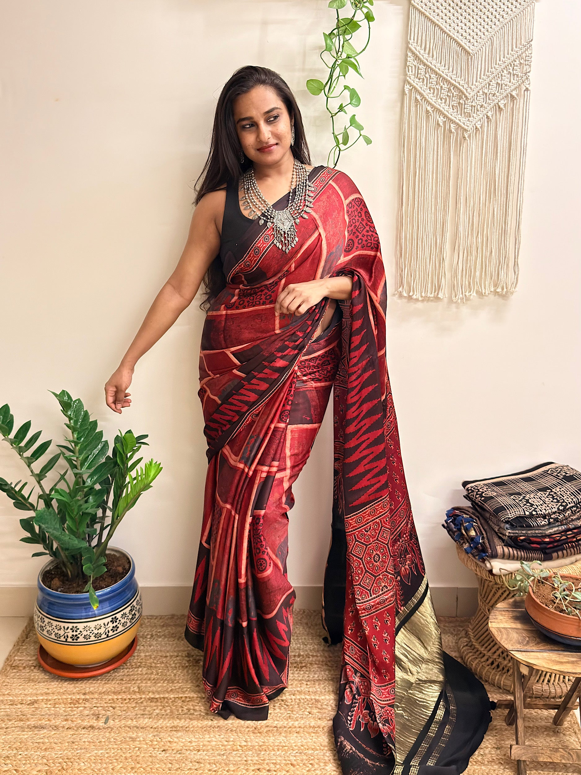 Jugnu: Deep Red and Black Ajrakh Handblock Printed Modal Saree with Tissue Pallu