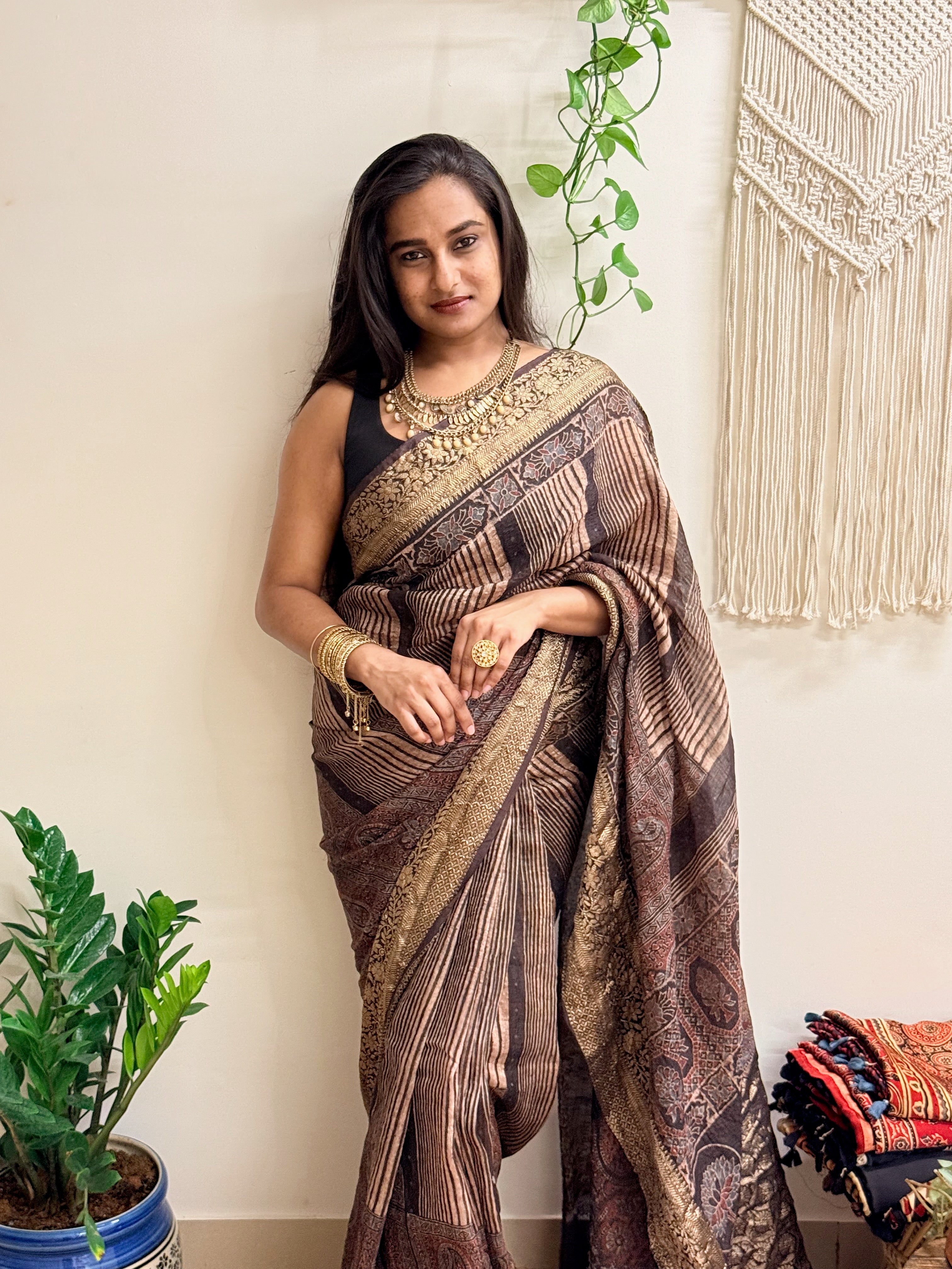 Gehrayee: Deep Brown Ajrakh Handblock Printed Linen Saree with Zari Border
