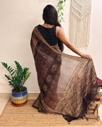 Gehrayee: Deep Brown Ajrakh Handblock Printed Linen Saree with Zari Border