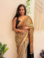 The Eclipse: Beige and Black Striped Ajrakh Handblock Printed Modal Saree