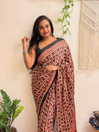 Daydream: Cream and Red Ajrakh Handblock Printed Modal Saree