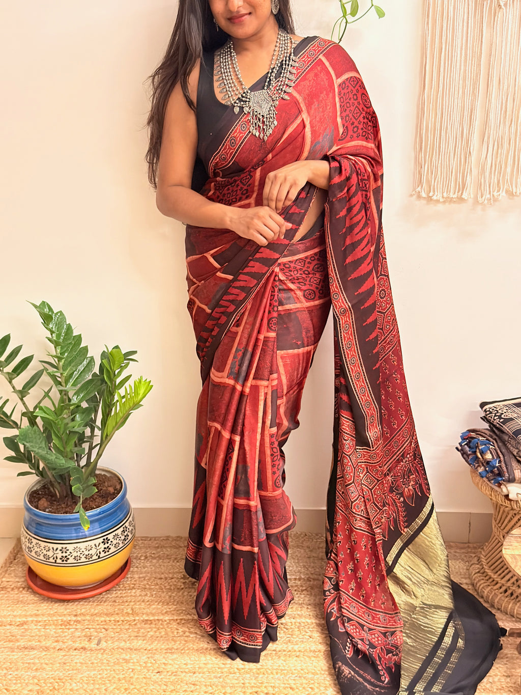 Jugnu: Deep Red and Black Ajrakh Handblock Printed Modal Saree with Tissue Pallu