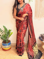 Jugnu: Deep Red and Black Ajrakh Handblock Printed Modal Saree with Tissue Pallu