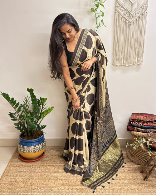 All Eyes: Cream Ajrakh Handblock Printed Modal Saree with Tissue Pallu