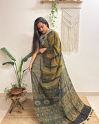 Gulzar: Forest Green and Mustard Ajrakh Handblock Printed Mul Cotton Saree