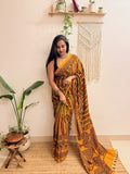 Basant: Turmeric Ajrakh Handblock Printed Mul Cotton Saree