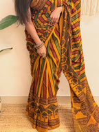 Basant: Turmeric Ajrakh Handblock Printed Mul Cotton Saree
