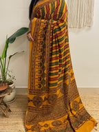Basant: Turmeric Ajrakh Handblock Printed Mul Cotton Saree