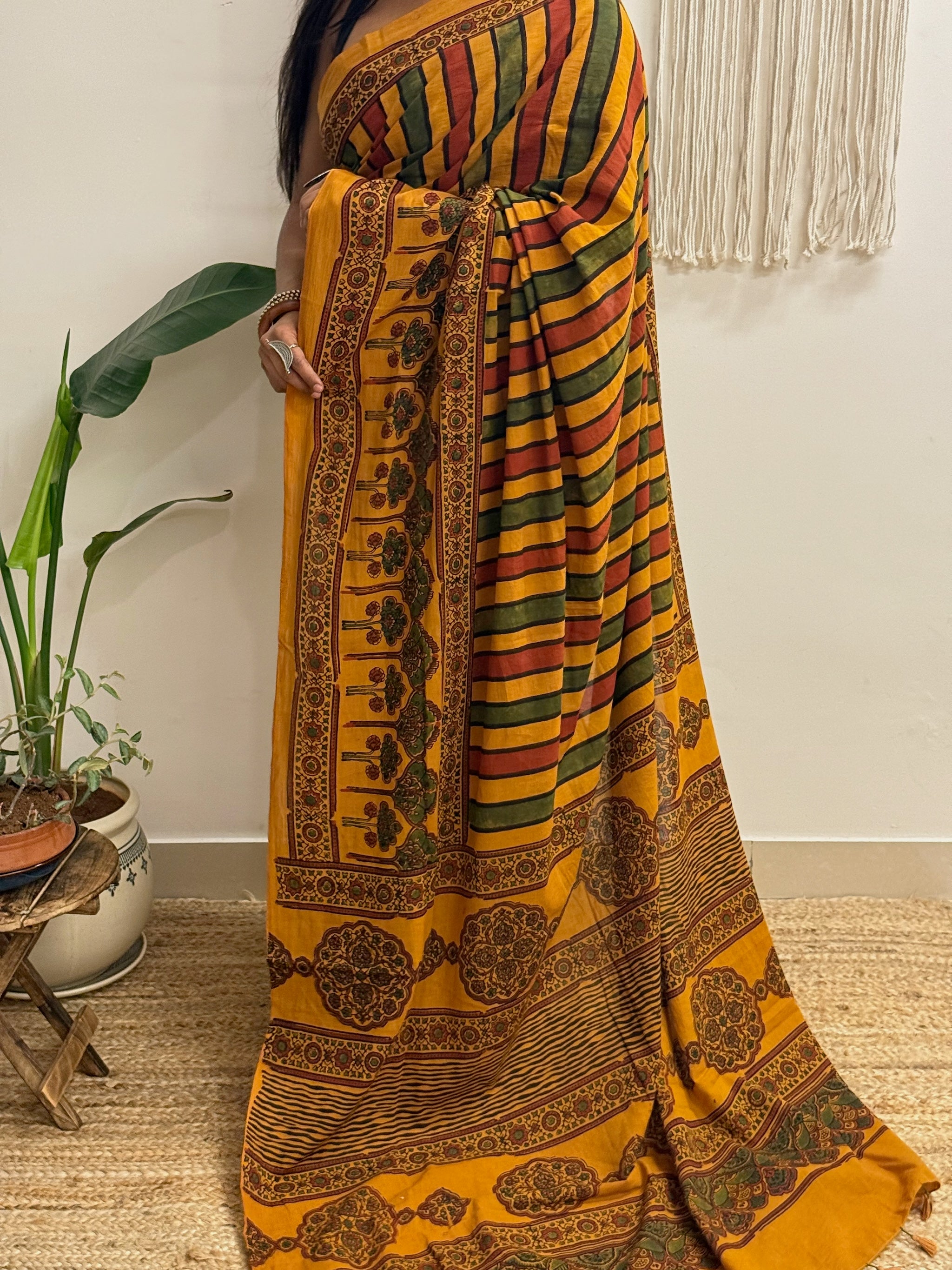 Basant: Turmeric Ajrakh Handblock Printed Mul Cotton Saree