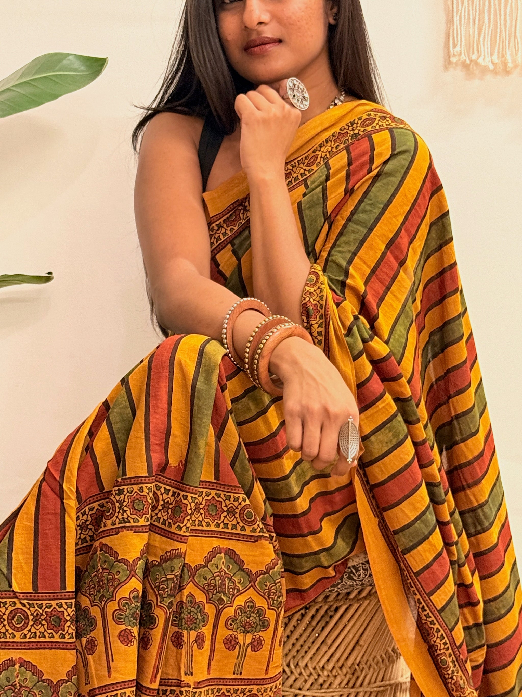 Basant: Turmeric Ajrakh Handblock Printed Mul Cotton Saree