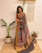 Adaa: Black Ajrakh Handblock Printed Mul Cotton Saree with Zari Border