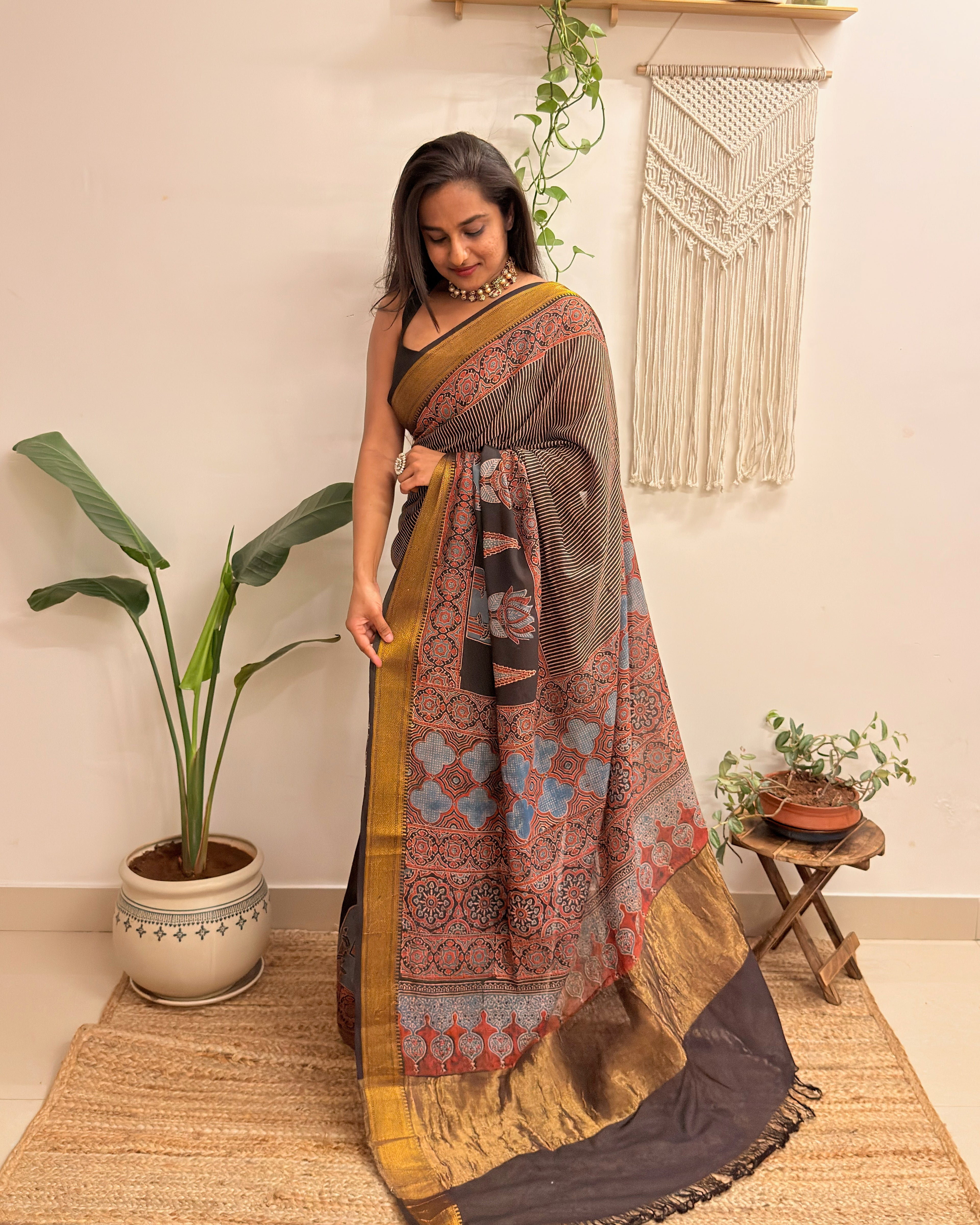 Adaa: Black Ajrakh Handblock Printed Mul Cotton Saree with Zari Border