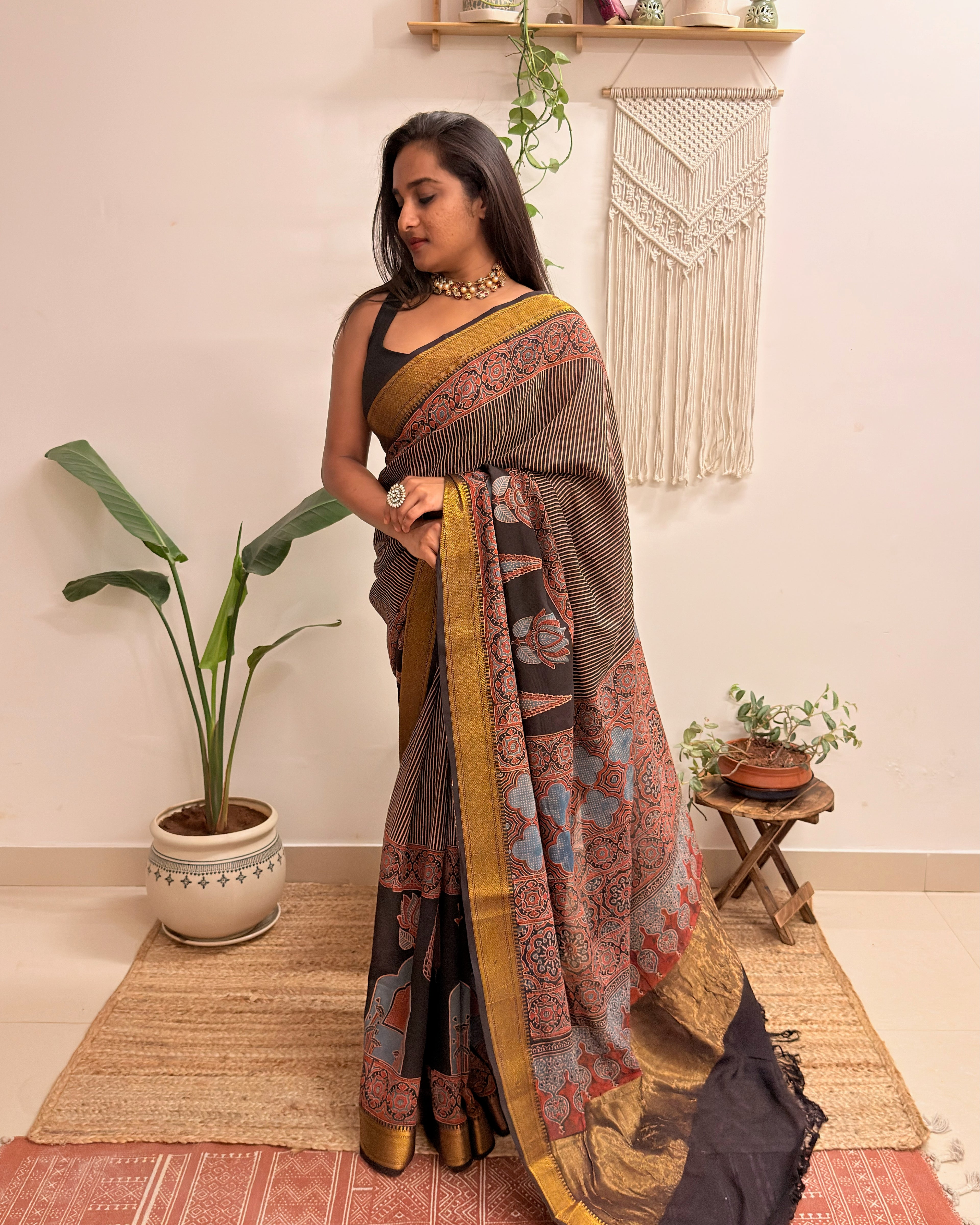 Adaa: Black Ajrakh Handblock Printed Mul Cotton Saree with Zari Border