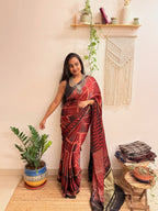 Jugnu: Deep Red and Black Ajrakh Handblock Printed Modal Saree with Tissue Pallu