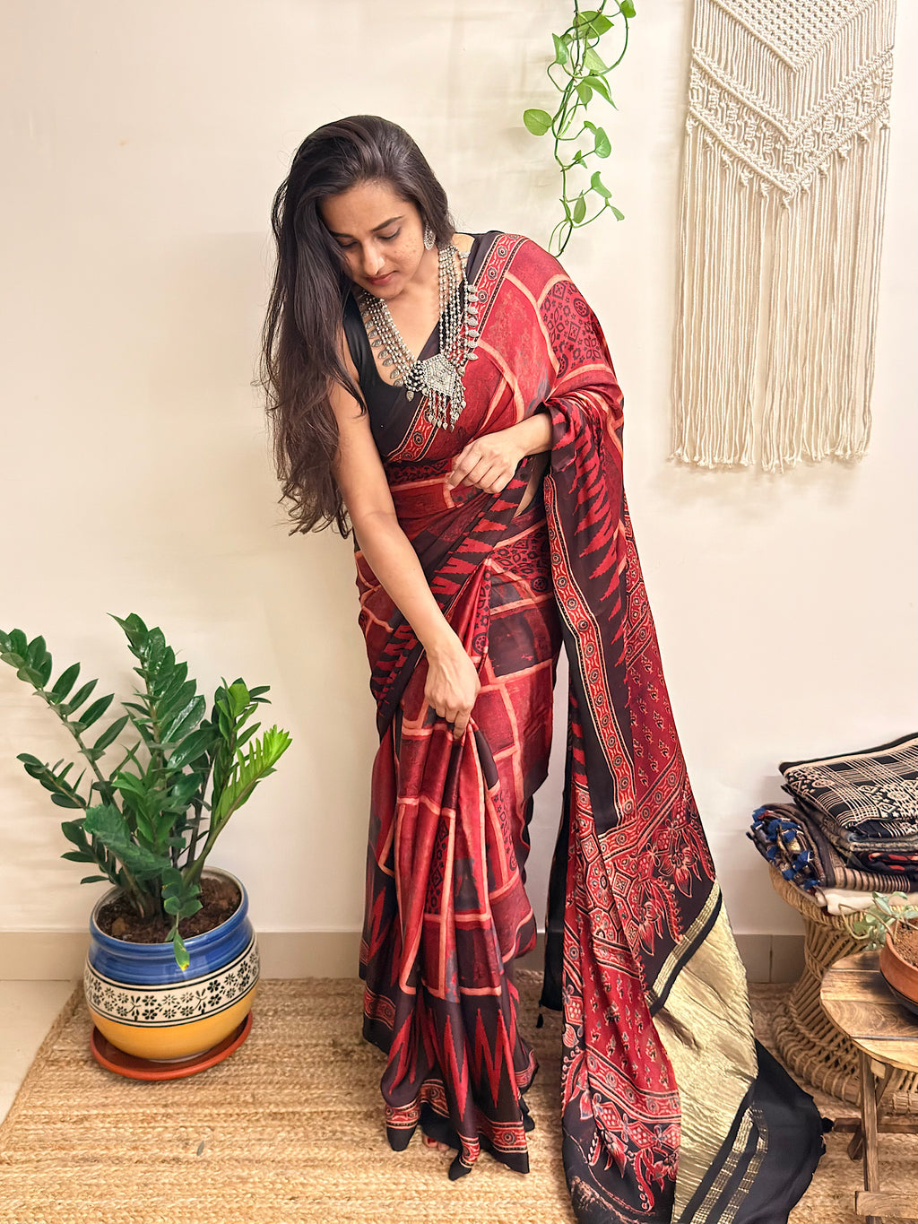 Jugnu: Deep Red and Black Ajrakh Handblock Printed Modal Saree with Tissue Pallu