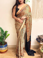 The Eclipse: Beige and Black Striped Ajrakh Handblock Printed Modal Saree